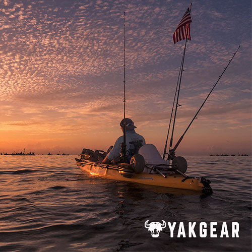 kayak fishing at sunset